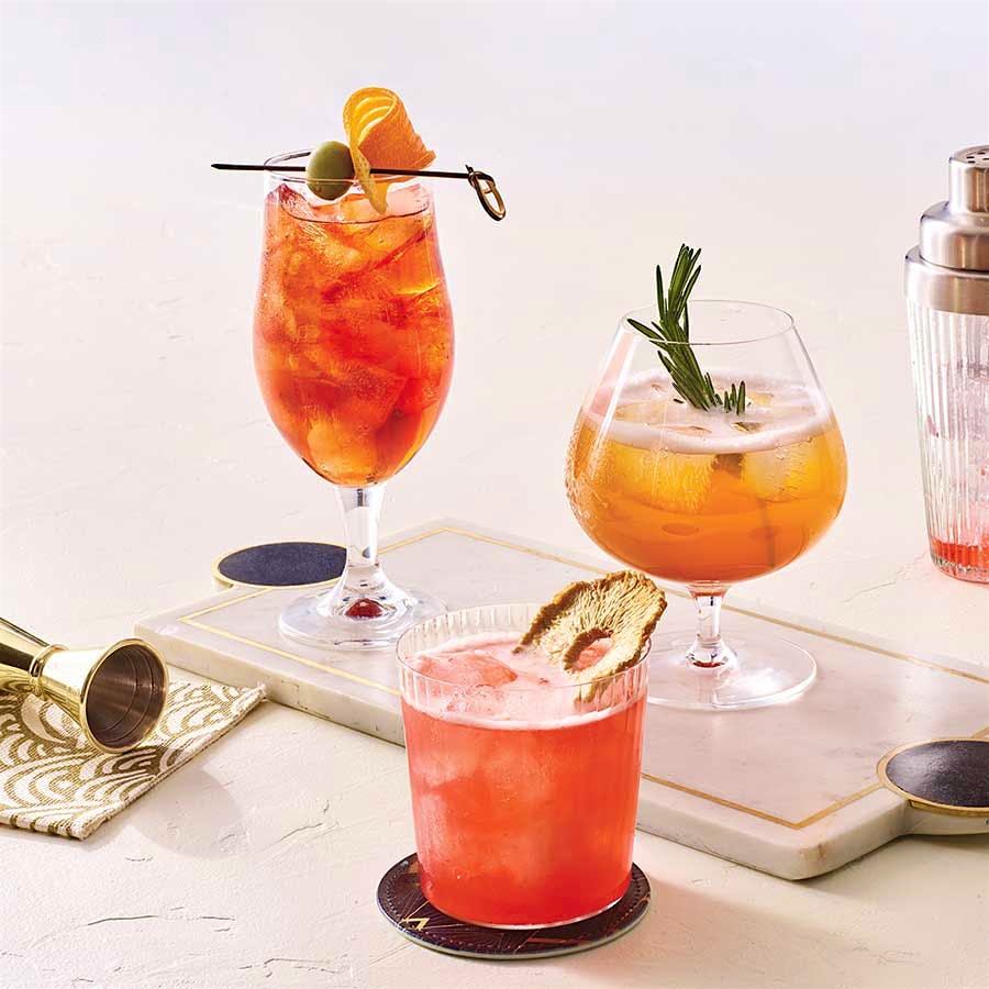 Red aperitivos work for a wide range of cocktails: (from left) the Fent el Vermut, the Birds and the Bees and the Rosa Spritz.