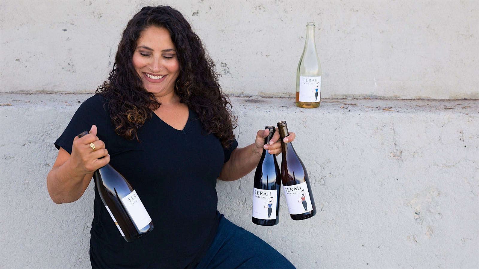 Terah Bajjalieh with bottles of her wine.