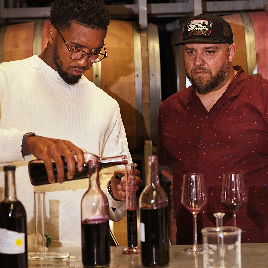 NBA star Donovan Mitchell blends wine under the tutelage of Prisoner Wine Company winemaker Todd Ricard in his Napa cellars.