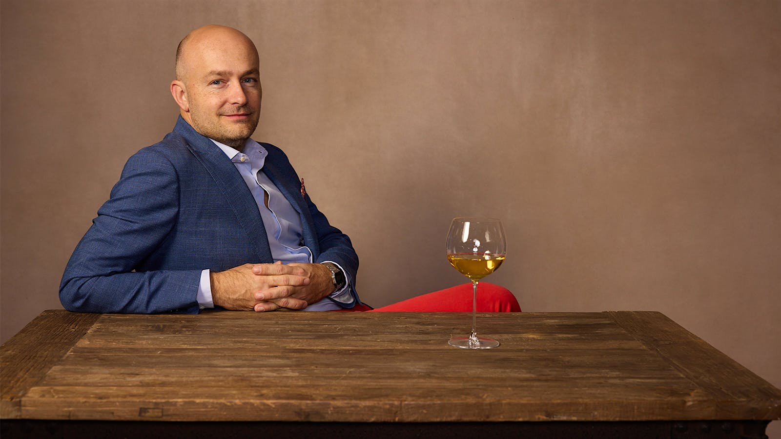 Burgundy vintner Erwan Faiveley, of Domaine Faiveley, with a glass of 2008 Bâtard-Montrachet