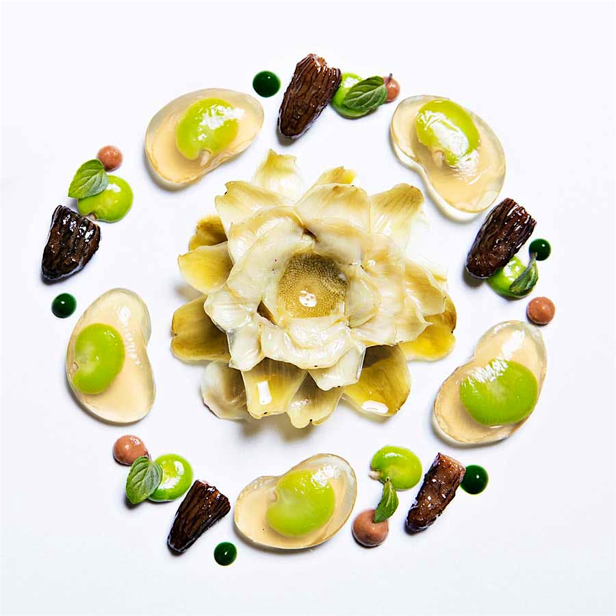 Somni is returning with chef Aitor Zabala's high concept dishes, like this mint broth served with fava beans, artichokes and morel mushrooms.