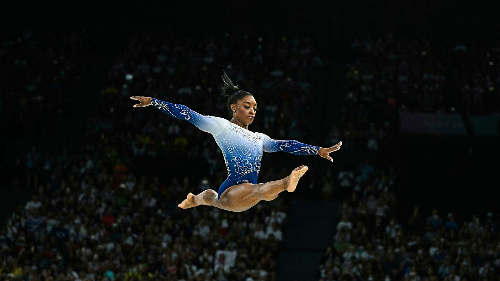 Simones Biles leaps at the Paris Olympics