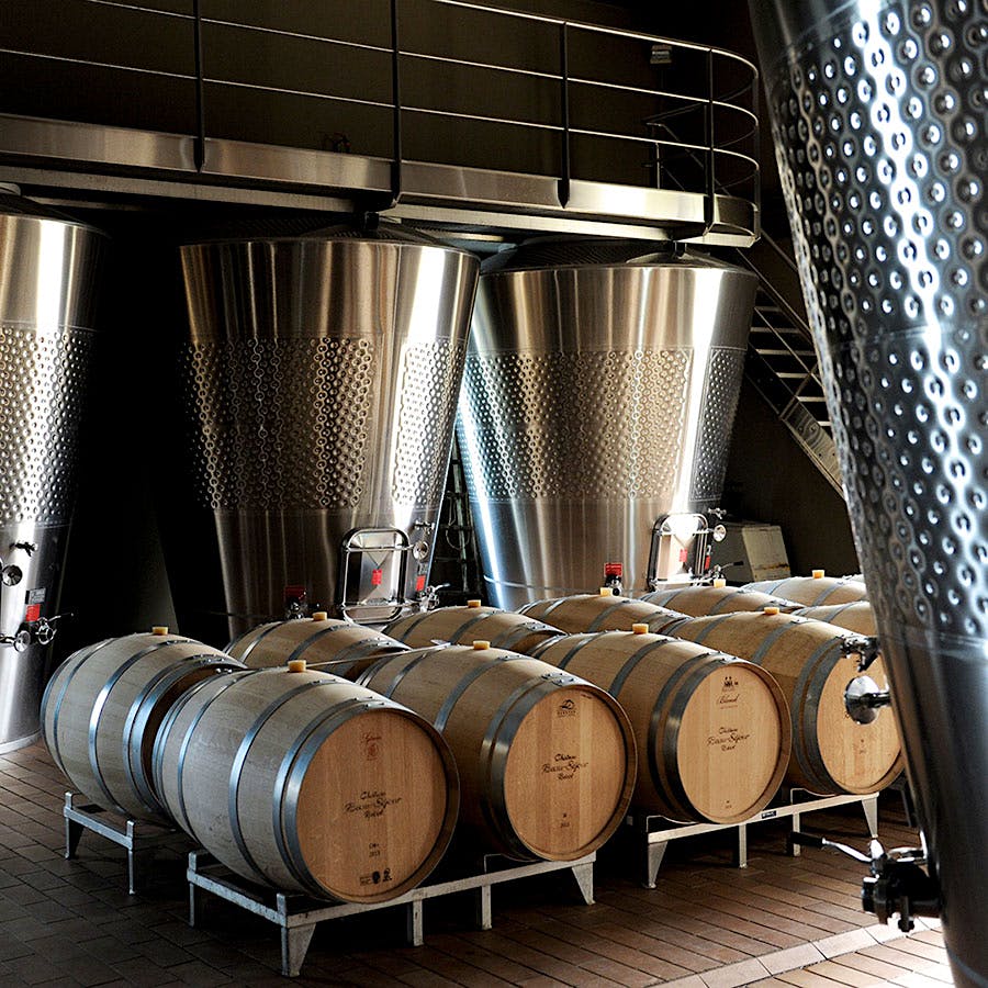 Barrels and tanks at Château Canon in Bordeaux, France. Photo credit: Christophe Goussard