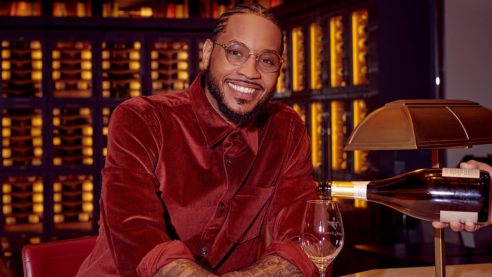 Carmelo Anthony with a glass of wine. Photo credit: Meron Menghistab