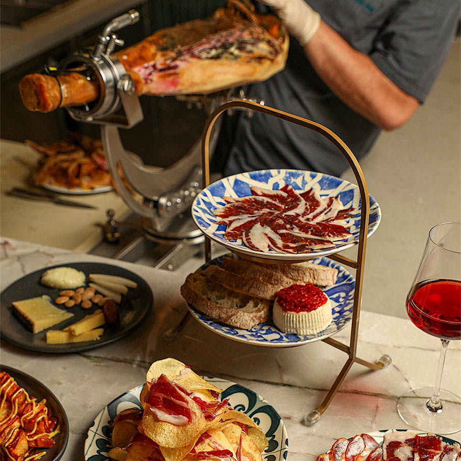 Enjoy hand-sliced jamón and Portuguese bites at Emeril Lagasse's latest venture, 34 Restaurant and Bar.