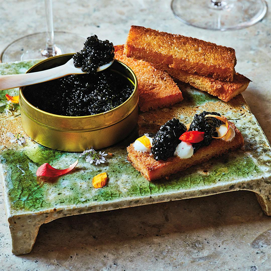 Break out the mother-of-pearl spoons this holiday season with recipes from star chefs like San Francisco's Michael Tusk.