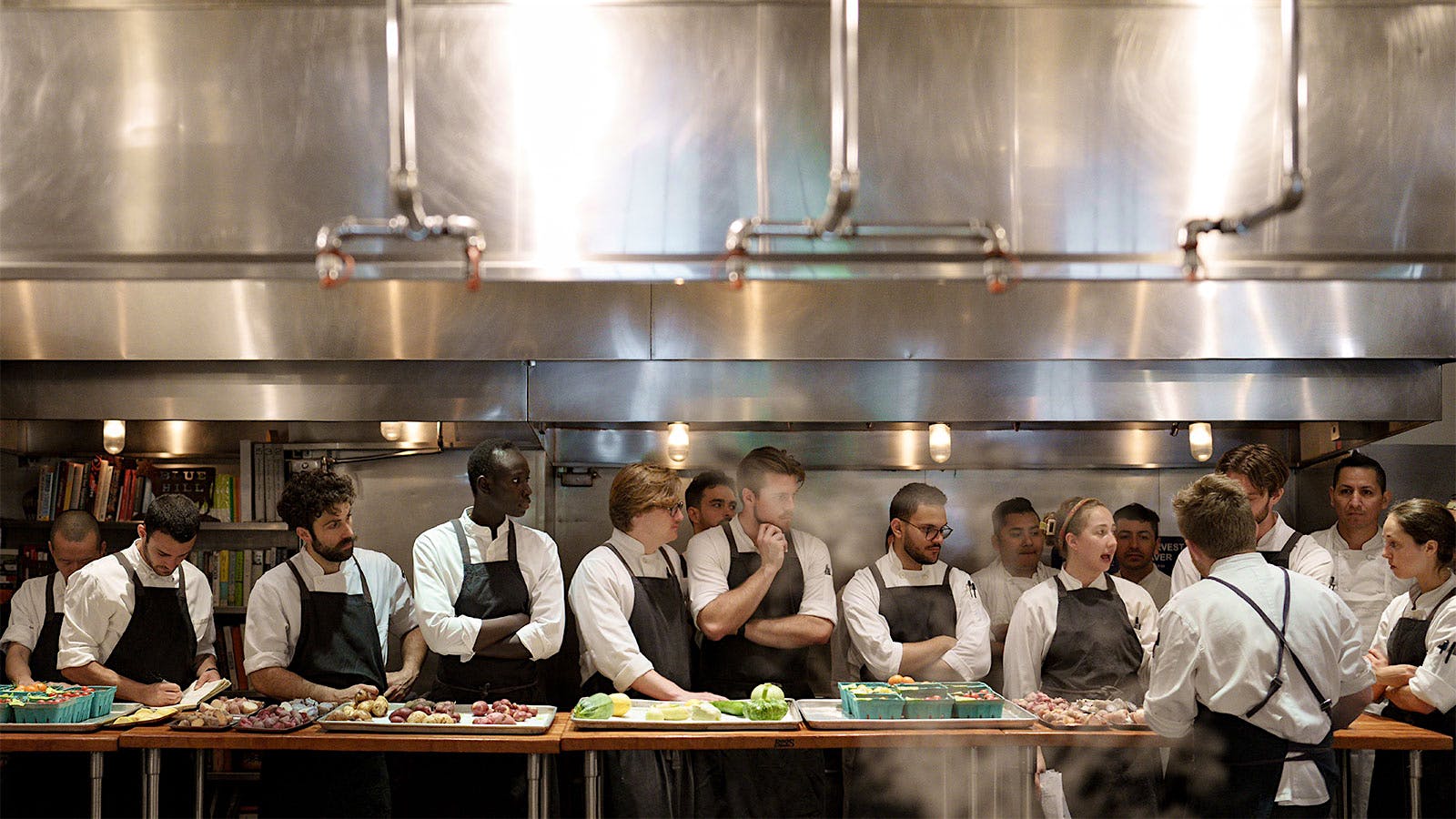 The kitchen filled with cooks pre-shift at Blue Hill at Stone Barns in Pocantico Hills, New York