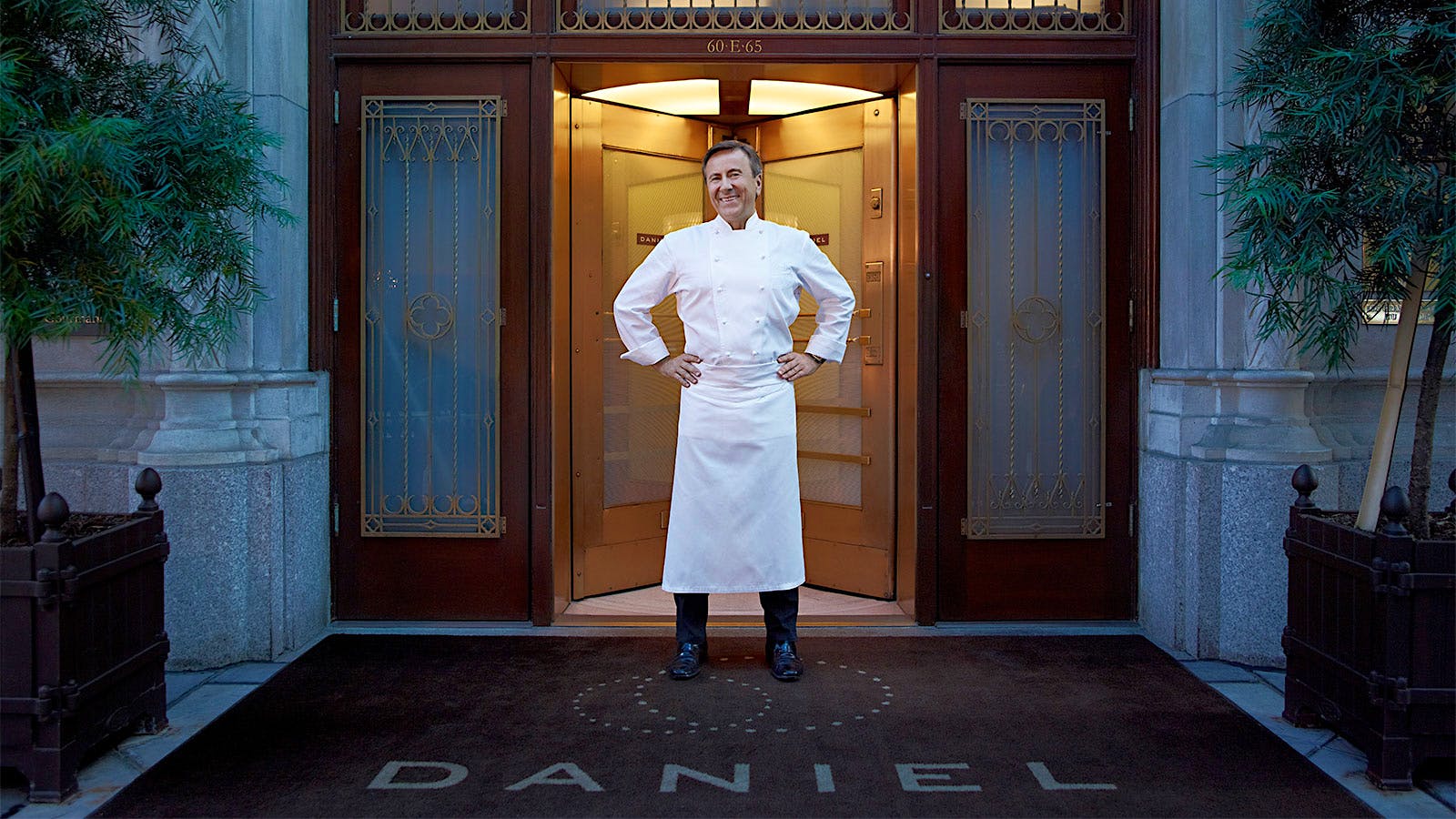  Chef Daniel Boulud standing&nbsp;in front of his restaurant Daniel in New York City