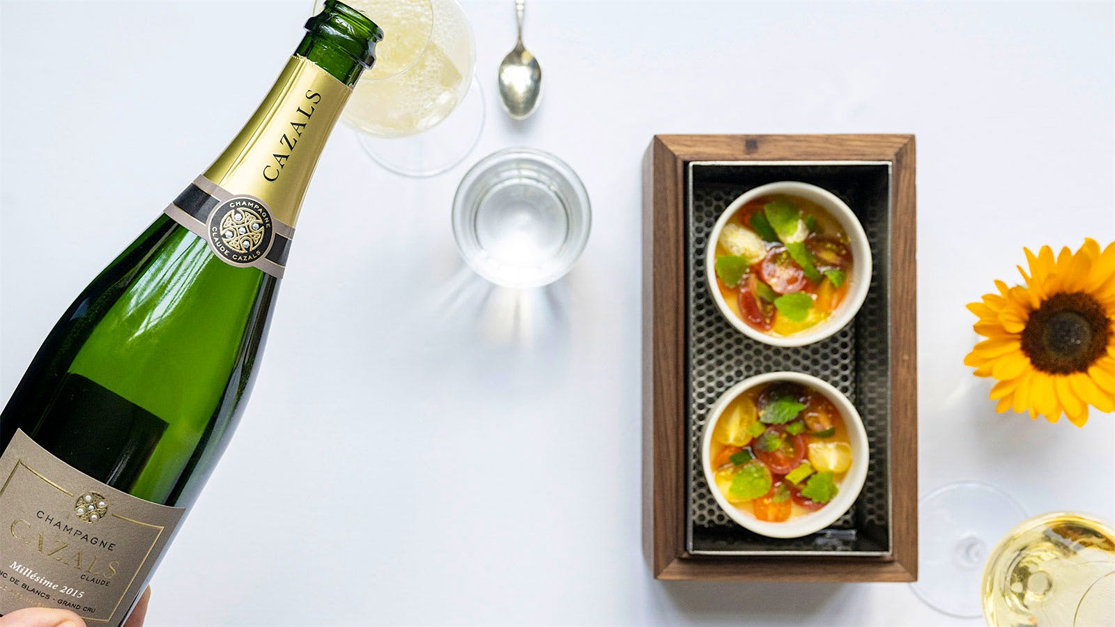  Tomato broth served with Champagne Cazals Blanc de Blanc at Eleven Madison Park in New York City