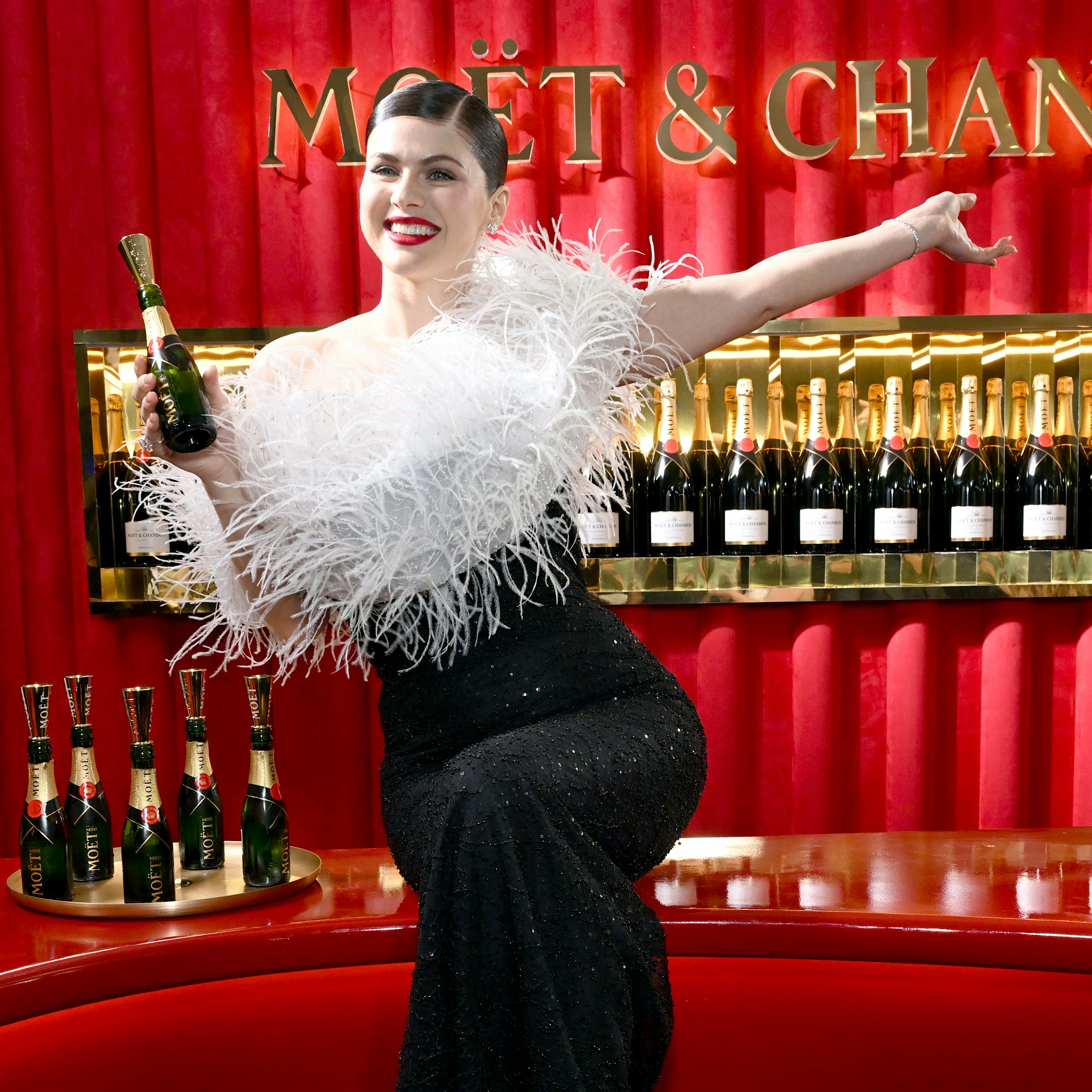 <em>A Complete Unknown</em> co-stars Monica Barbaro (left) and Elle Fanning enjoyed Moët & Chandon at the 82nd Golden Globes.
