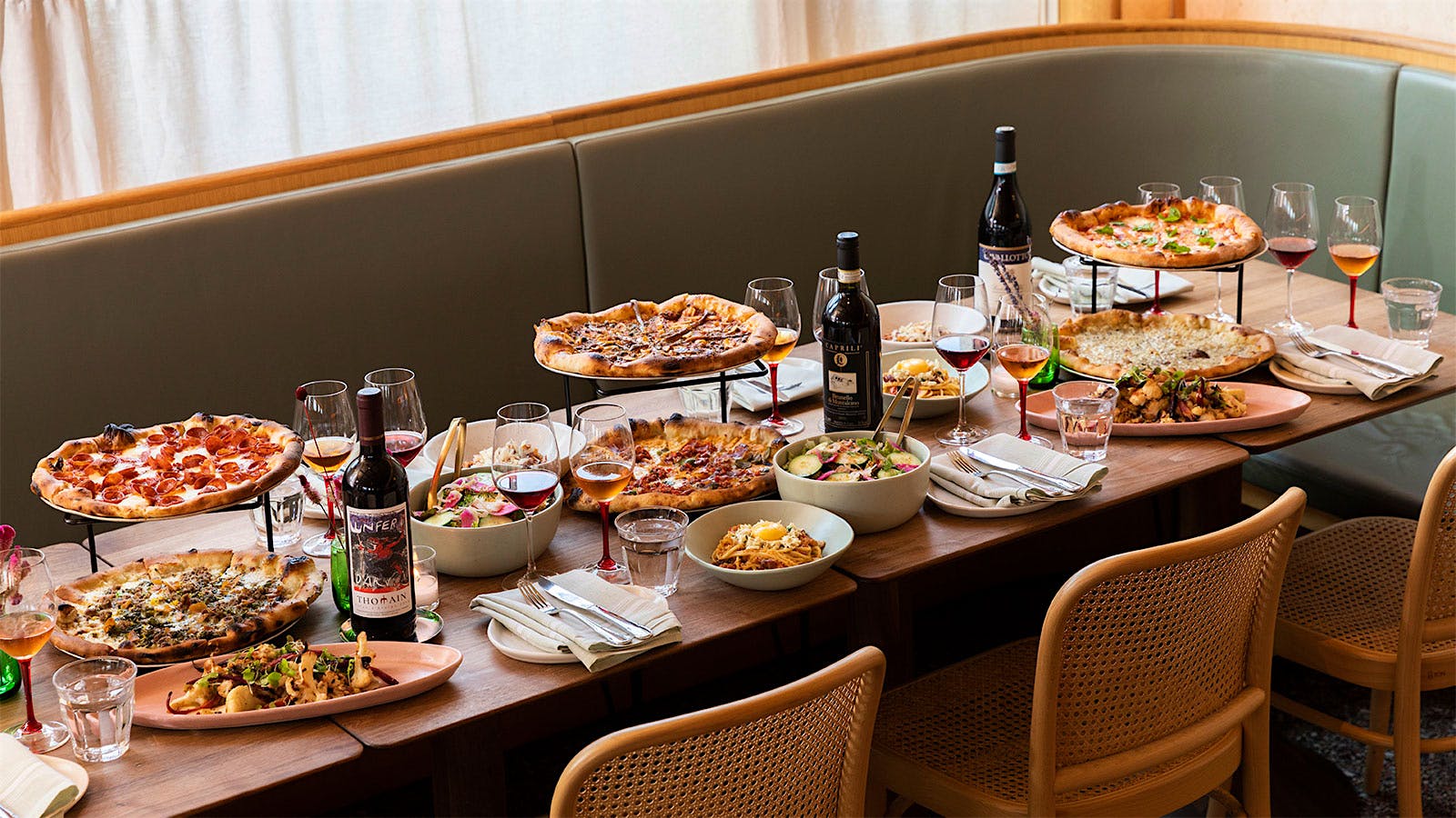  A selection of pizzas, side dishes and wine from Rosie Cannonball in Houston