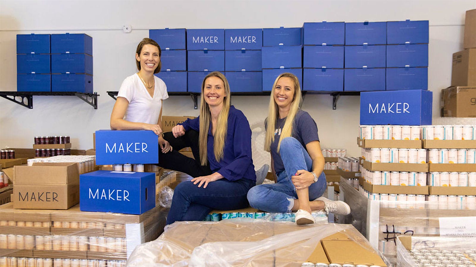  Maker founders Kendra Kawala, Sarah Hoffman and Zoe Victor, left to right, with palettes of canned wine.