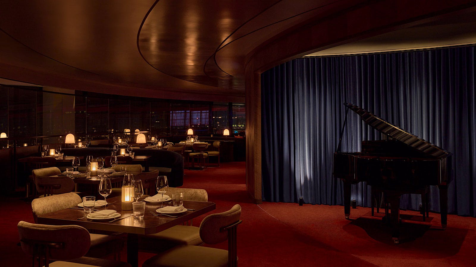  Dining room, featuring a grand piano, at The View in NYC