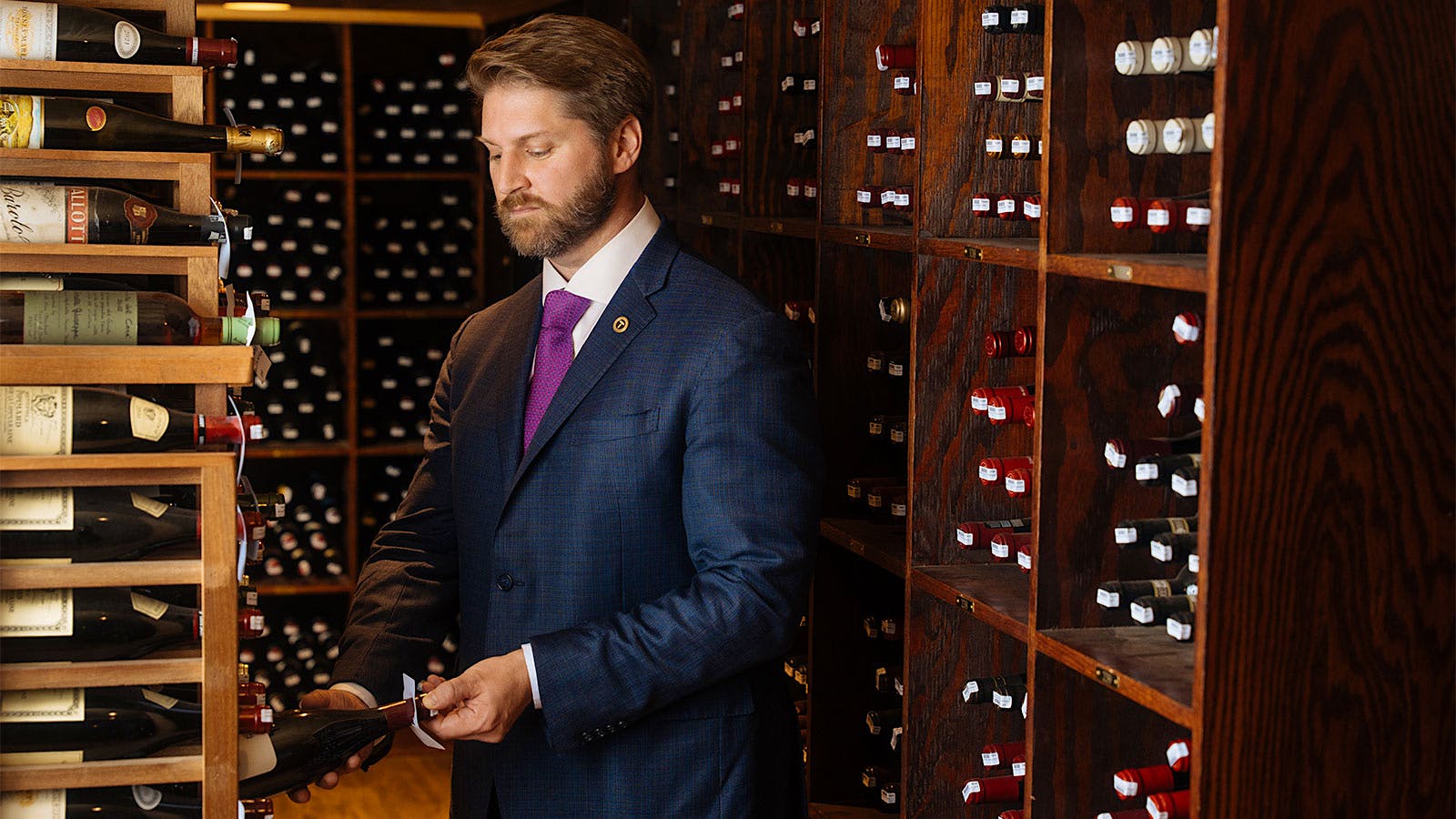  Soby&rsquo;s wine director, John Mitchell, in the wine cellar, pulling a bottle from a rack
