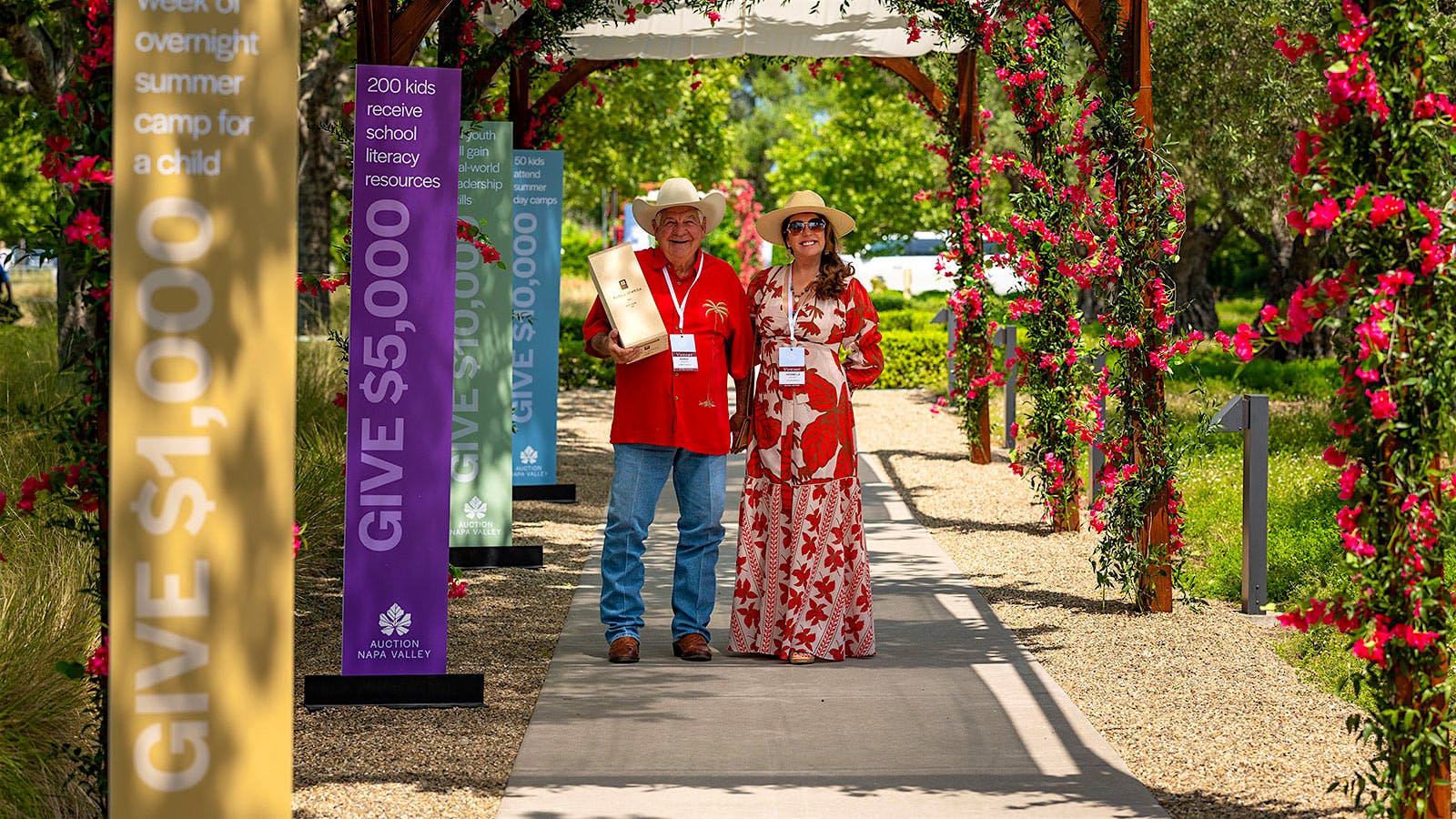  Honorary auction co-chairs Robin and Michelle Baggett, owners of Alpha Omega Winery