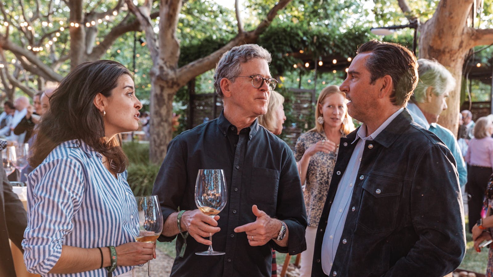  Andy Erickson, Paul Hobbs and Agustina Hobbs, right to left, at the 2025 Wine Spectator Bring Your Own Magnum Party in Napa Valley.