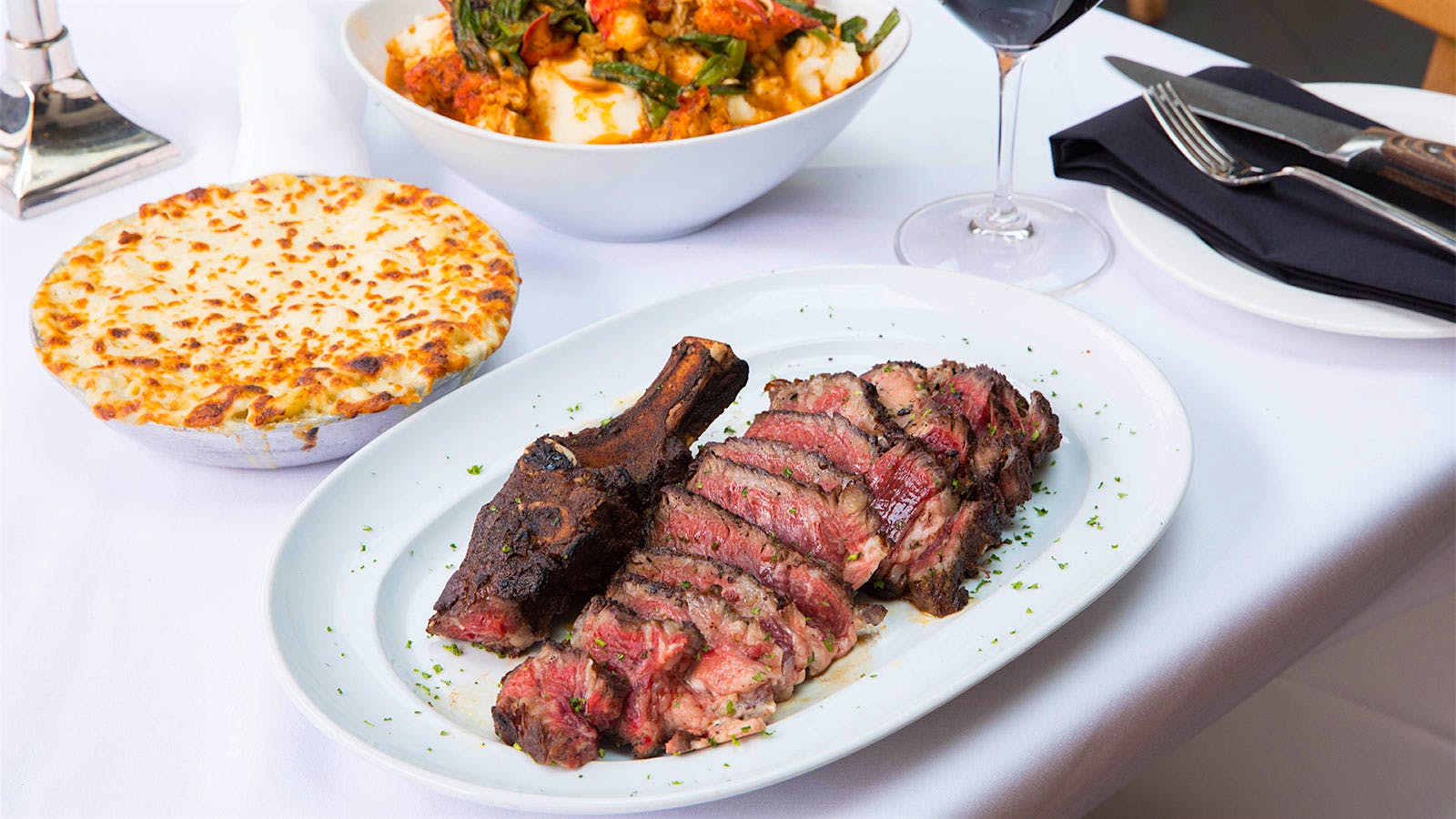  Steak, macaroni and cheese and a glass of red wine from Mastro's, the Steakhouse