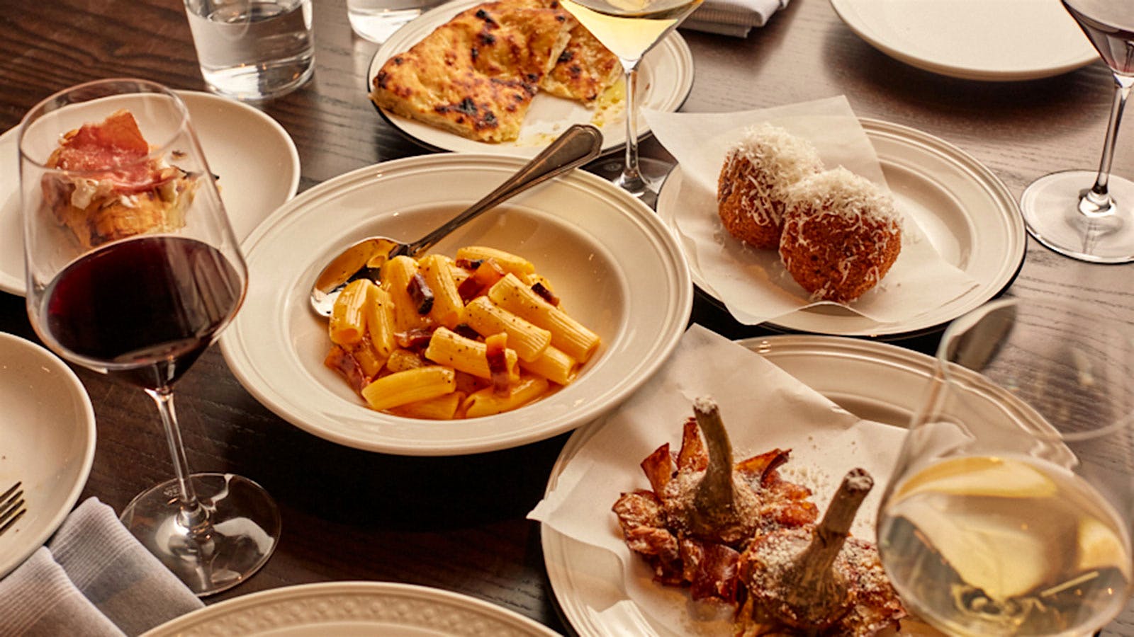  A selection of dishes and glasses of wine from il Carciofo