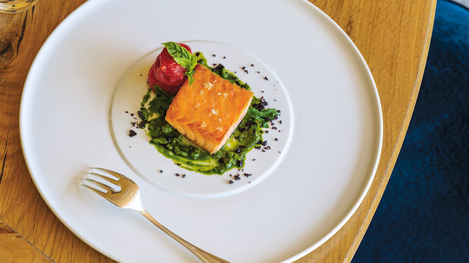 Thomas Keller's seared salmon entr&eacute;e with demi-sec tomatoes and olive basil vinaigrette