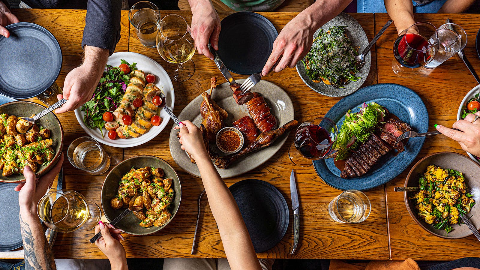  A selection of dishes and glasses of wine from Juniper and Ivy in San Diego