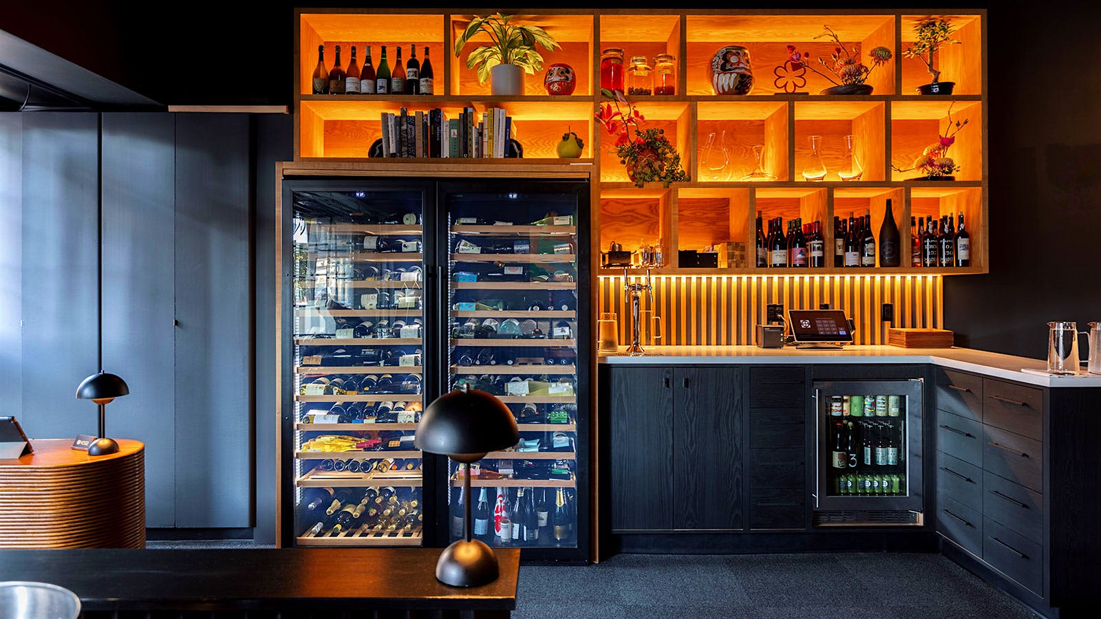 Wine fridges and the back bar at Restaurant Nisei in San Francisco