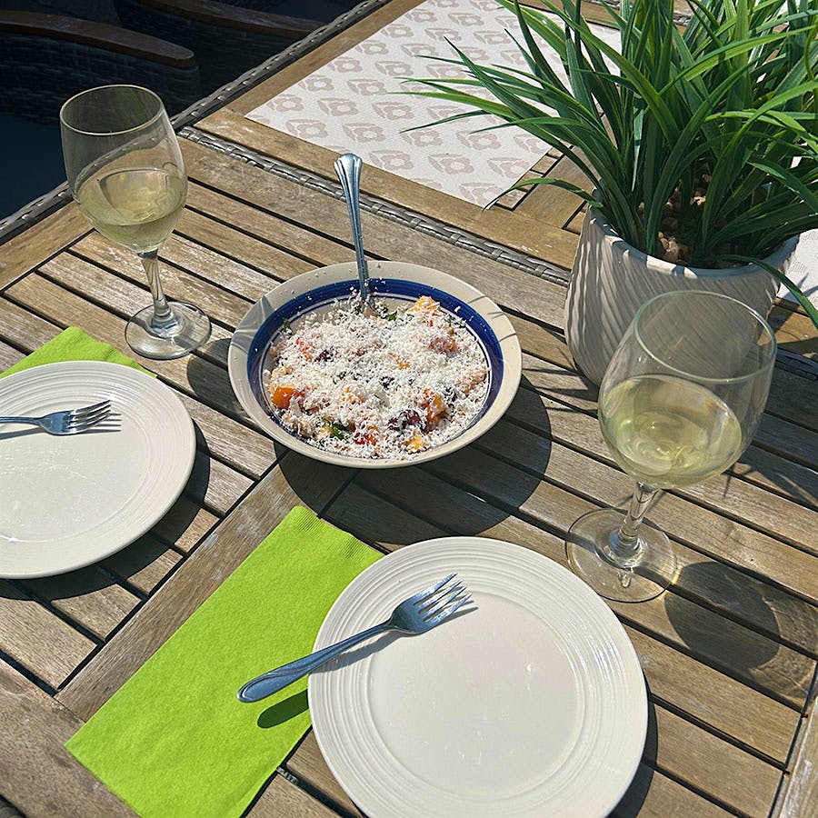 Look for a white wine that balances its fresh fruit flavors with mineral, herbal or spice notes that can coax more depth out of the salad.