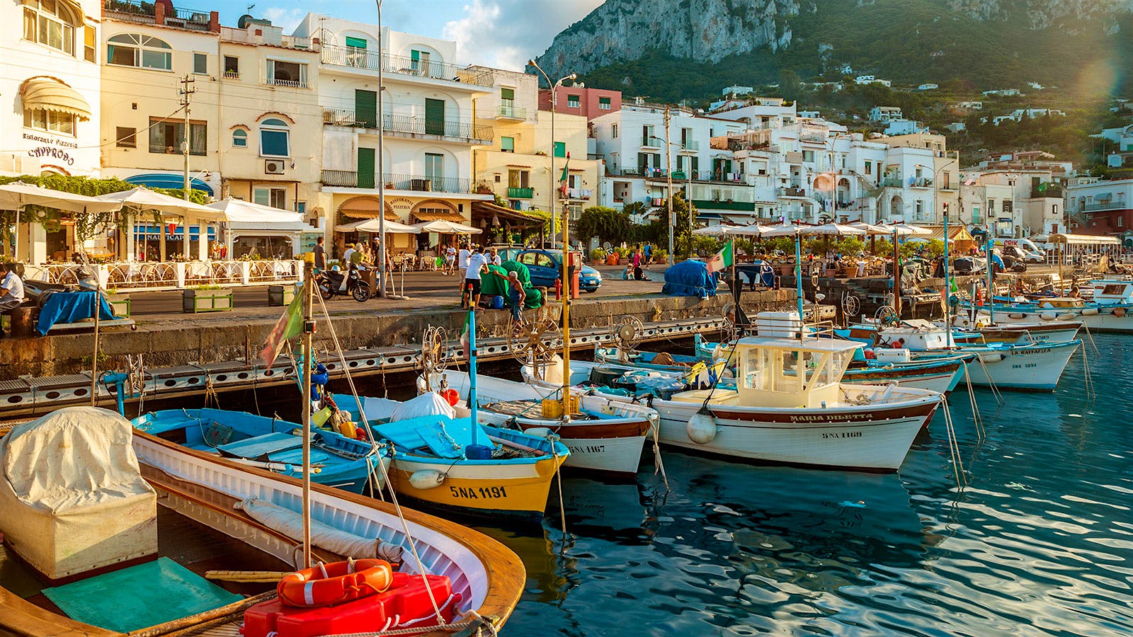  Colorful boats and buildings at Marina Grande port at Old Town on the Italian island of Capri