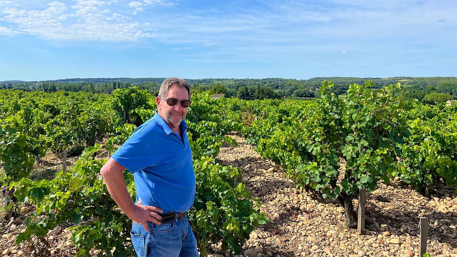  Aim&eacute; Sabon in one of Domaine de la Janasse's vineyards containing galets roul&eacute;s.