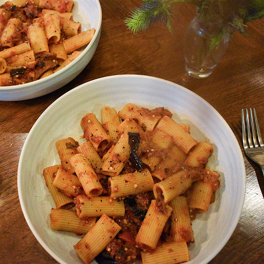 Roasting eggplants in the oven before putting them in a tomato sauce gives them color and more developed flavor.