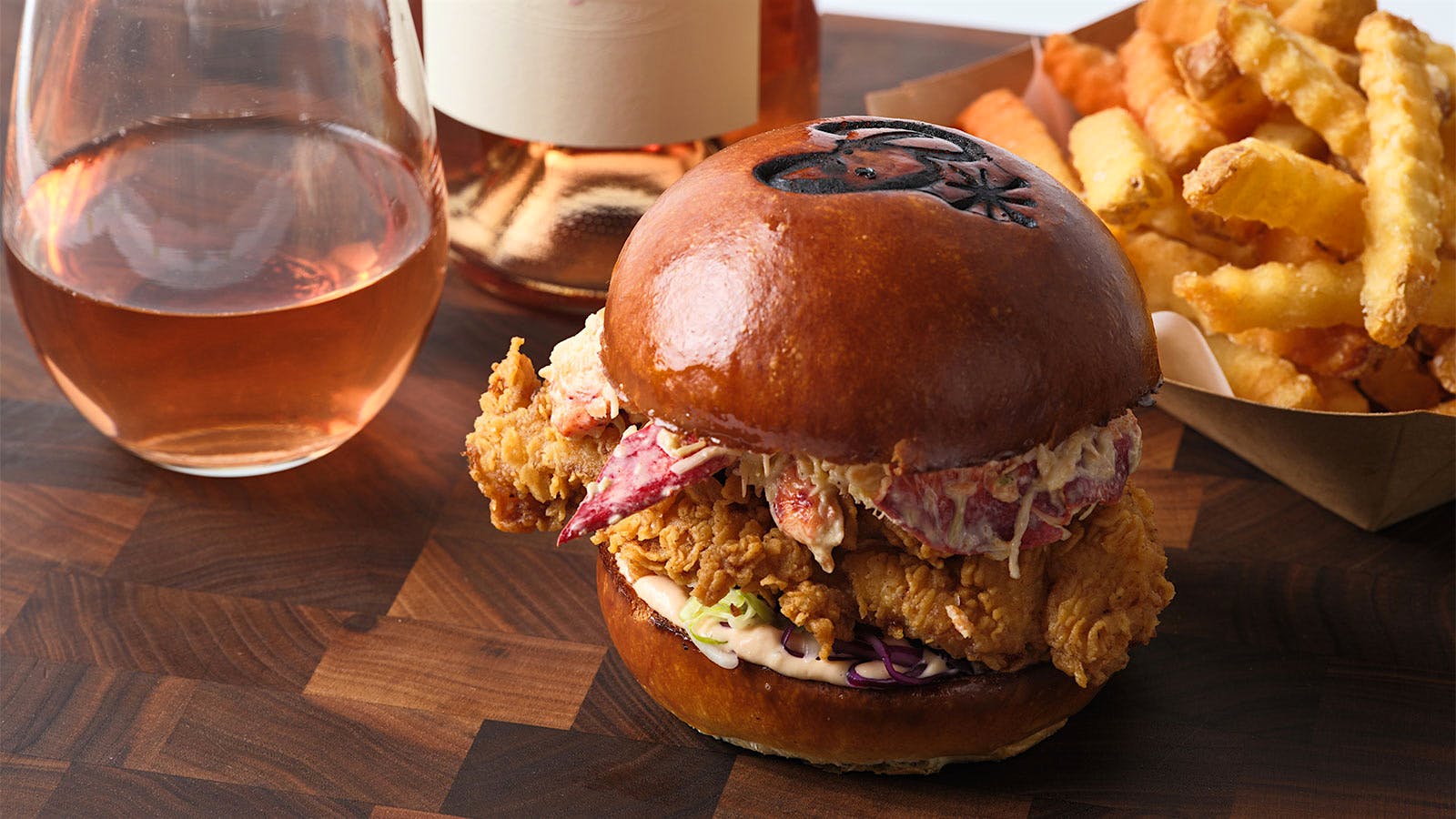  Fried chicken sandwiches and a bottle of ros&eacute;&nbsp;from Burgers and Half Bottles in Yountville, Calif.