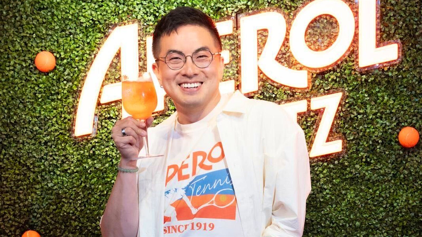 Bowen Yang at 2025 US Open with Aperol Spritz.