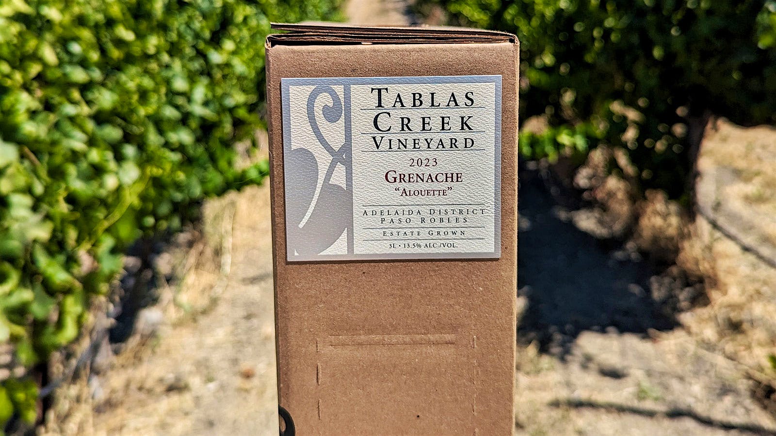  Tablas Creek&rsquo;s Aloutte Grenache boxed wine in the vineyard.