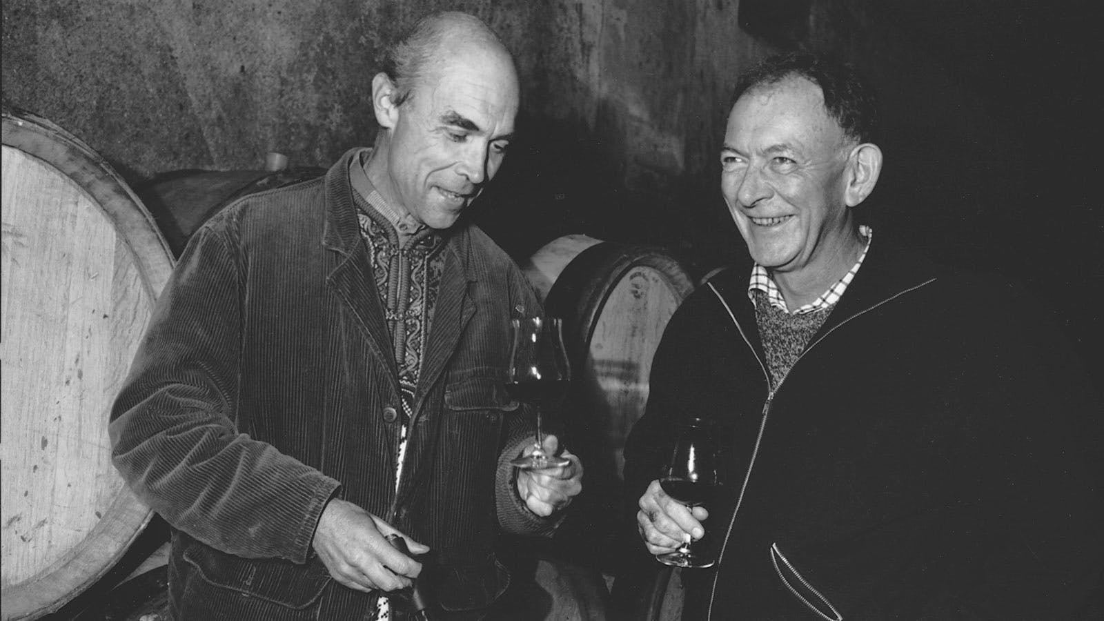  Black-and-white portrait of Domaine de la Roman&eacute;e-Conti head Aubert de Villaine and wine importer Kermit Lynch in a wine cellar