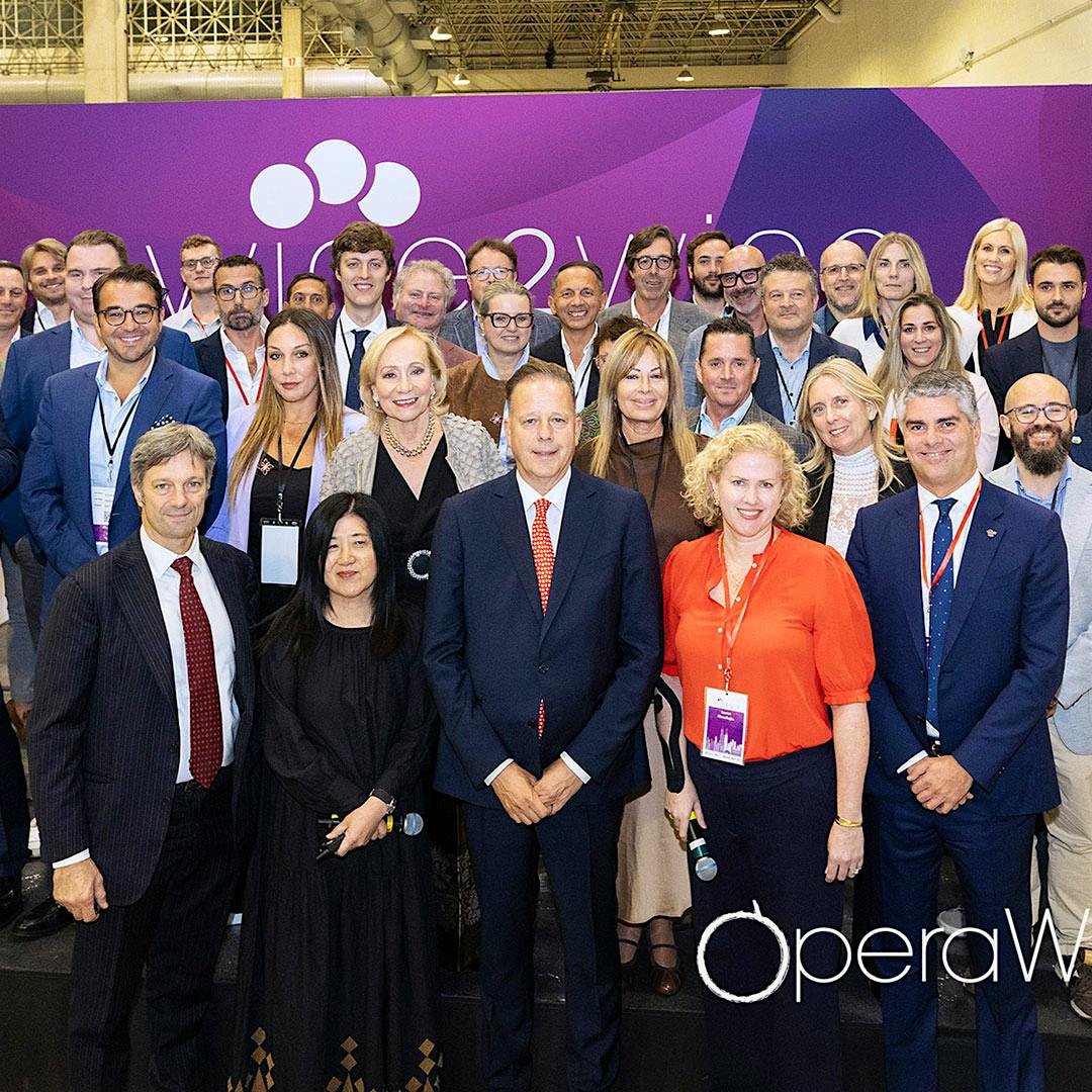 Wine Spectator’s Alison Napjus, front row in orange, joined Italian wine industry leaders in Chicago for Vinitaly USA’s second edition.