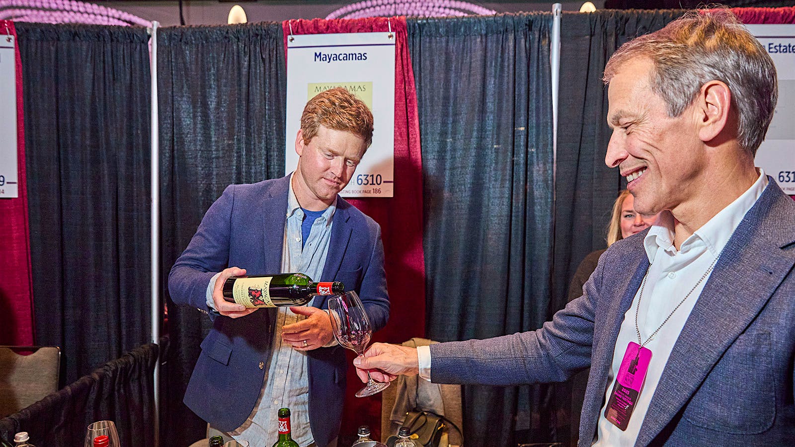  Mayacamas winemaker Braiden Albrect pouring wine for a guest at the 2025 NY Wine Experience