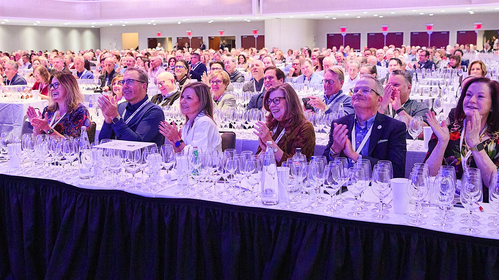  The crowd applauds at the 2025 New York Wine Experience at the New York Marriott Marquis.