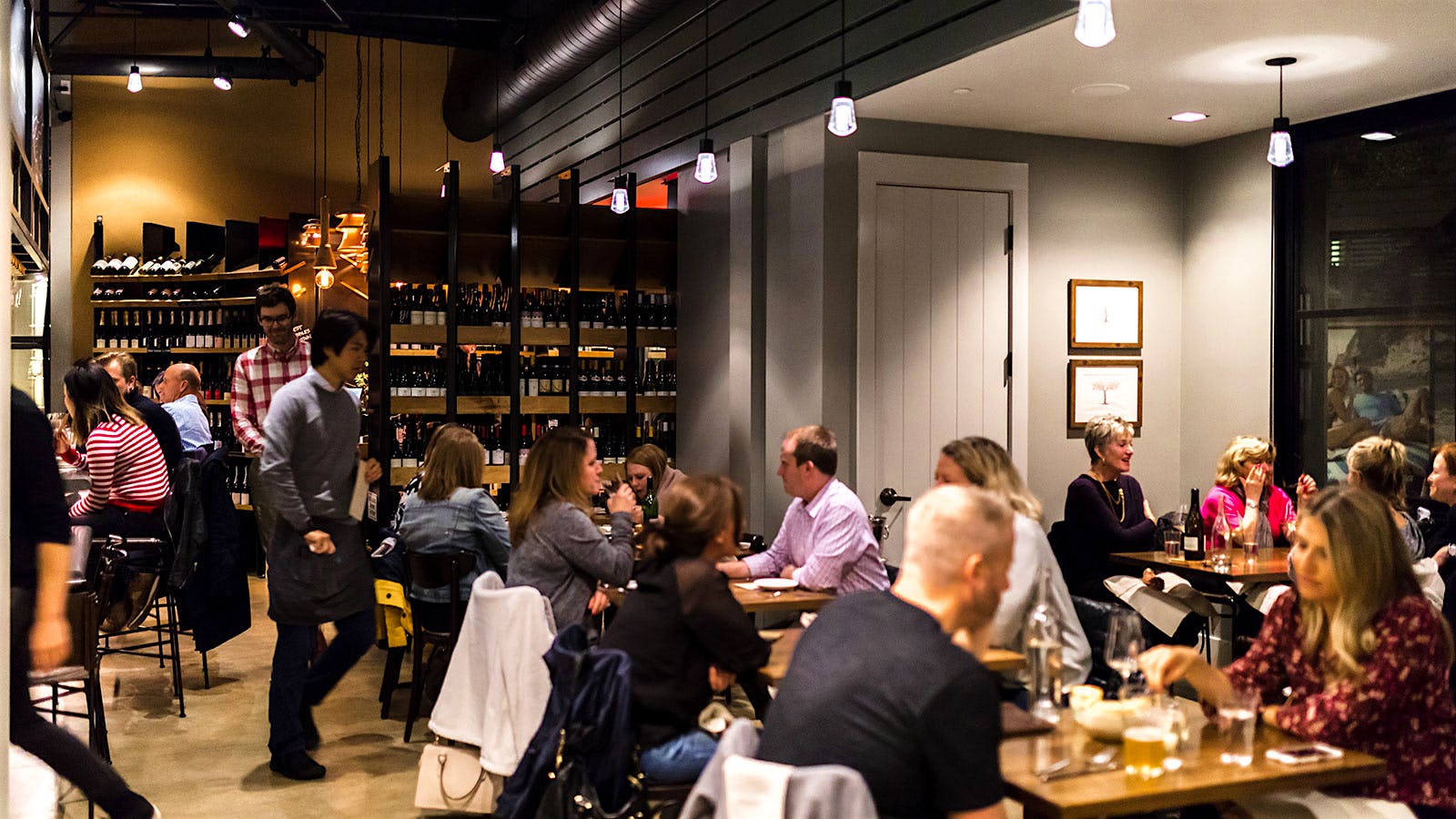  Guests dining and drinking wine at Compline in Napa Valley