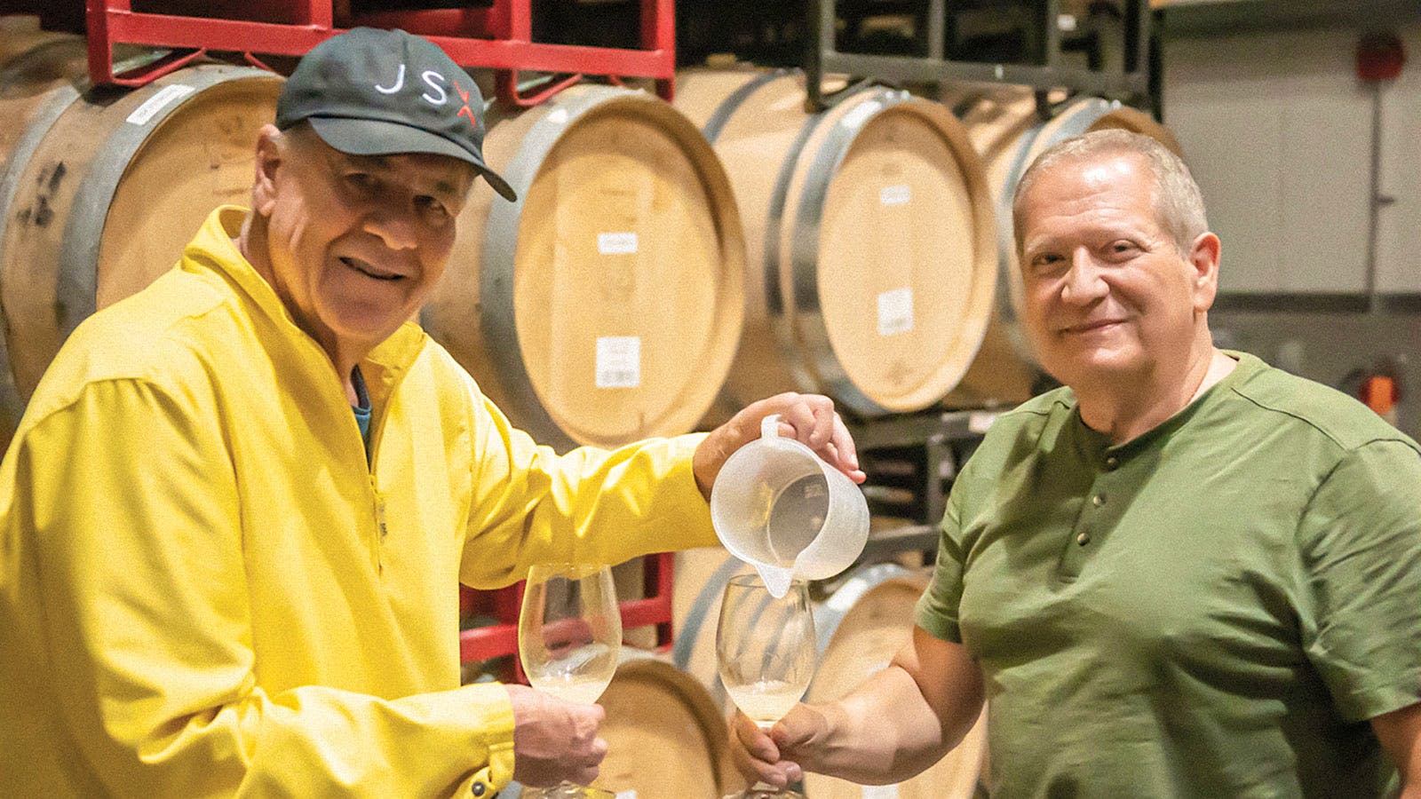  Nick Livanos and Eric Bryan Seuthe in the barrel cellar.] 