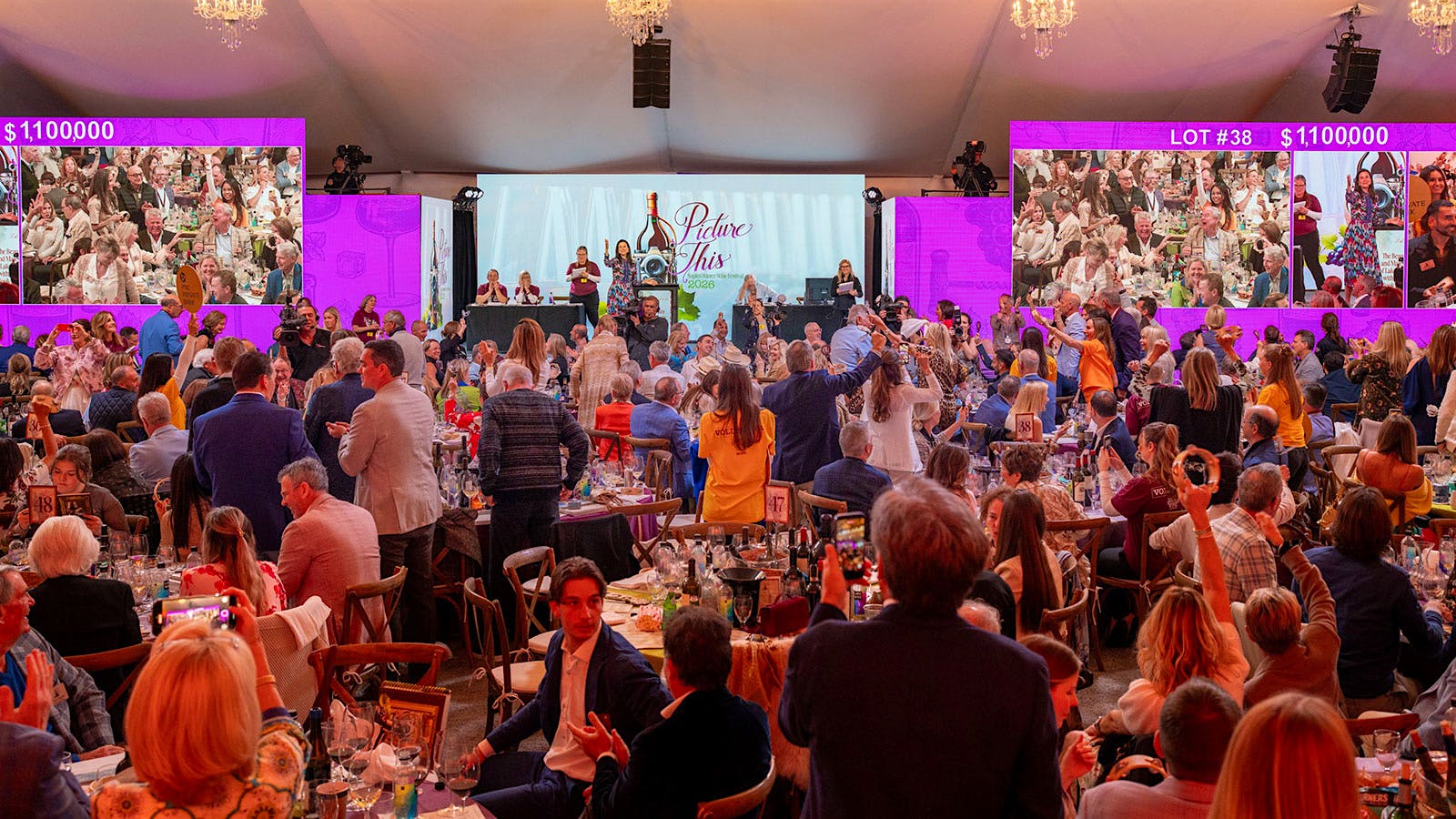 Attendees at the 26th annual Naples Winter Wine Festival bid on fine wines, luxe travel packages and more in support of local charities