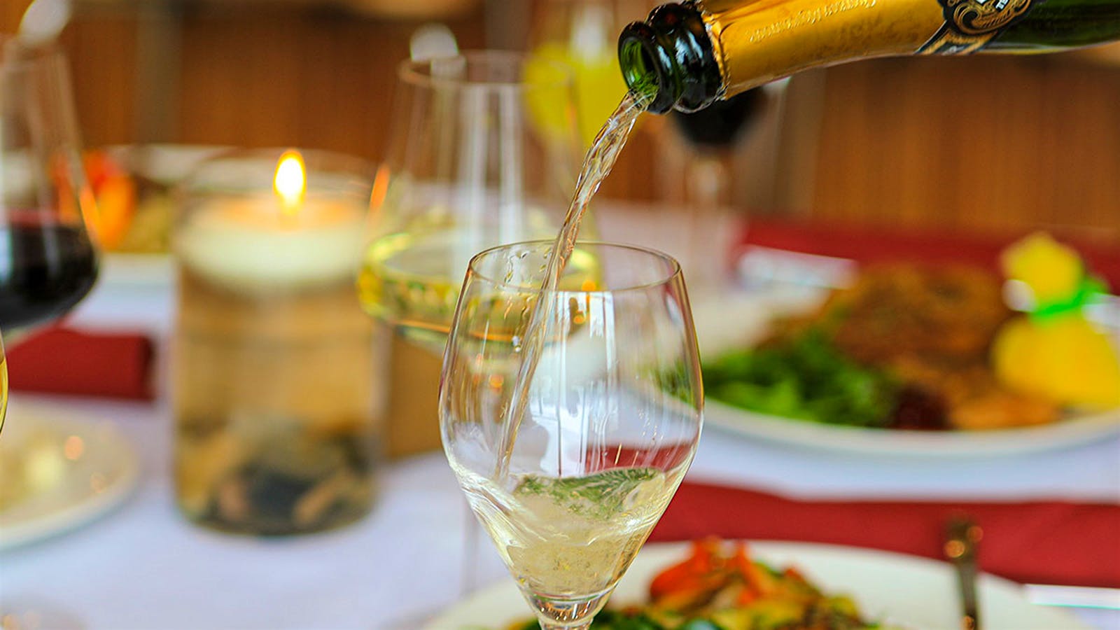  Wine poured into a glass at Vinca.
