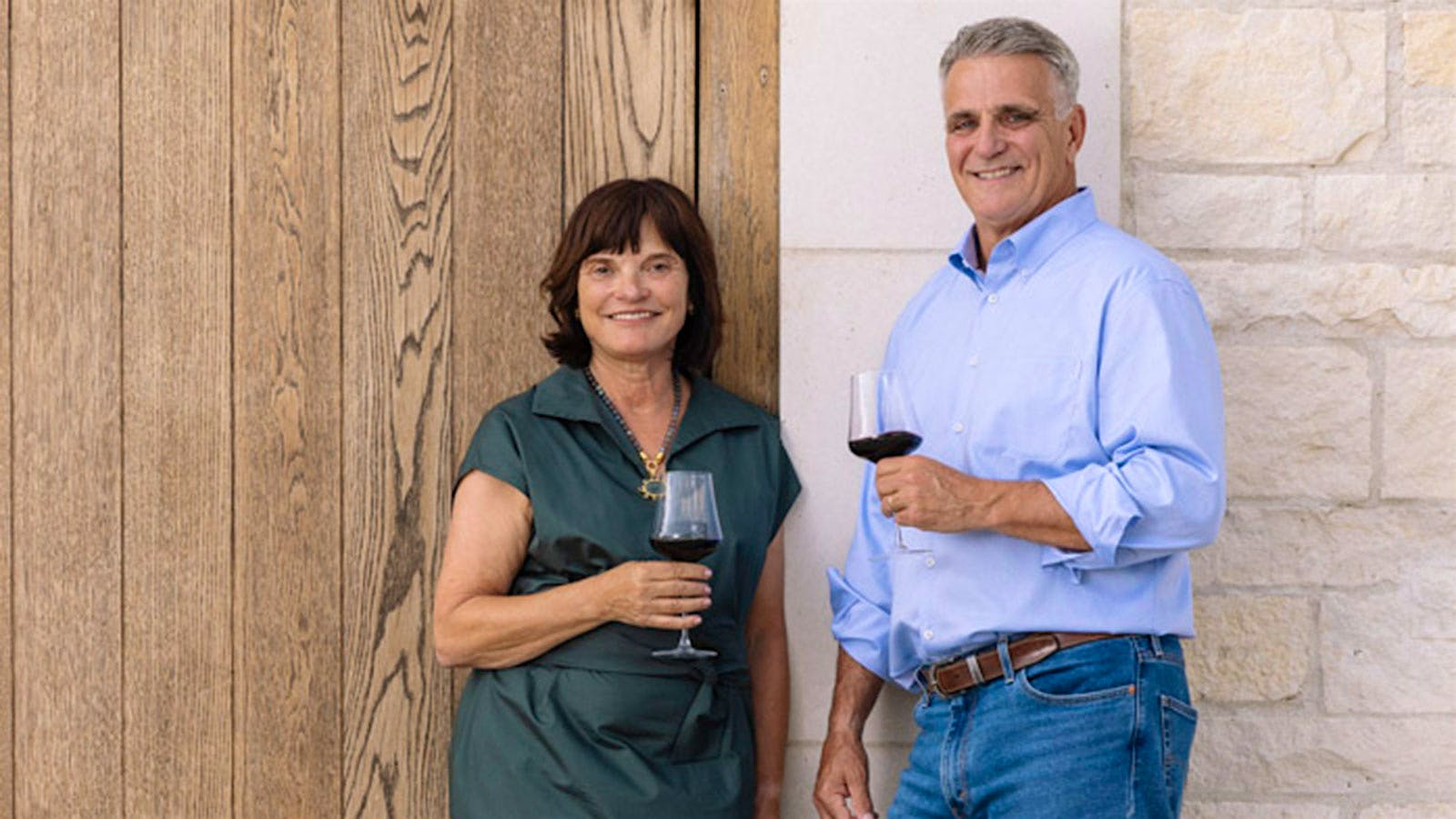 Barbara Banke and Rick Tigner with glasses of wine.] 