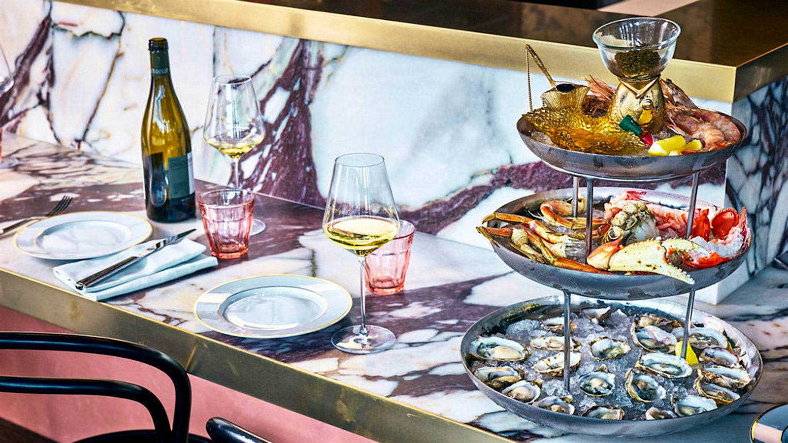 Seafood tower and glasses of white wine from JouJou in San Francisco.