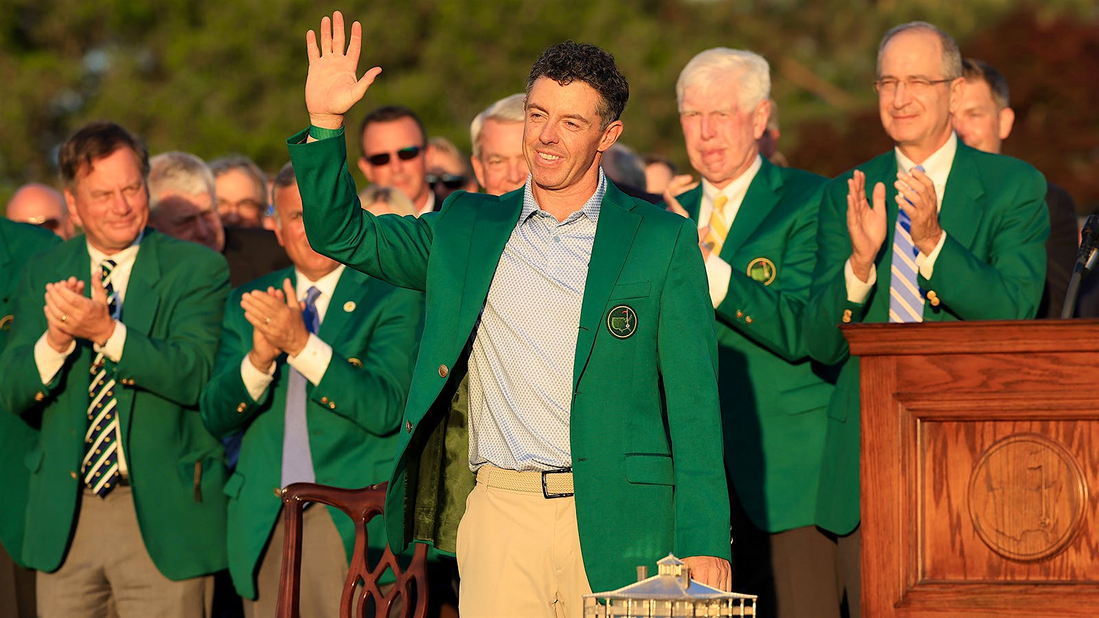 Rory McIlroy receives his Green Jacket after the final round of the 2026 Masters Tournament at Augusta National Golf Club.] 