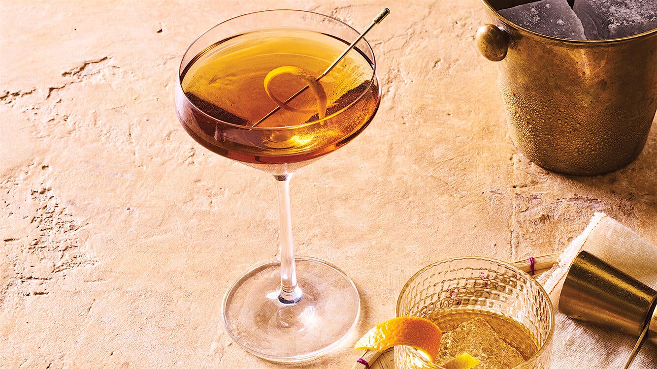 A glass of a classic Manhattan cocktail, made with tequila.