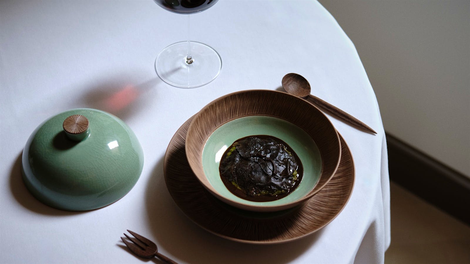 Spring green porridge from Oyatte, topped with black truffle.
