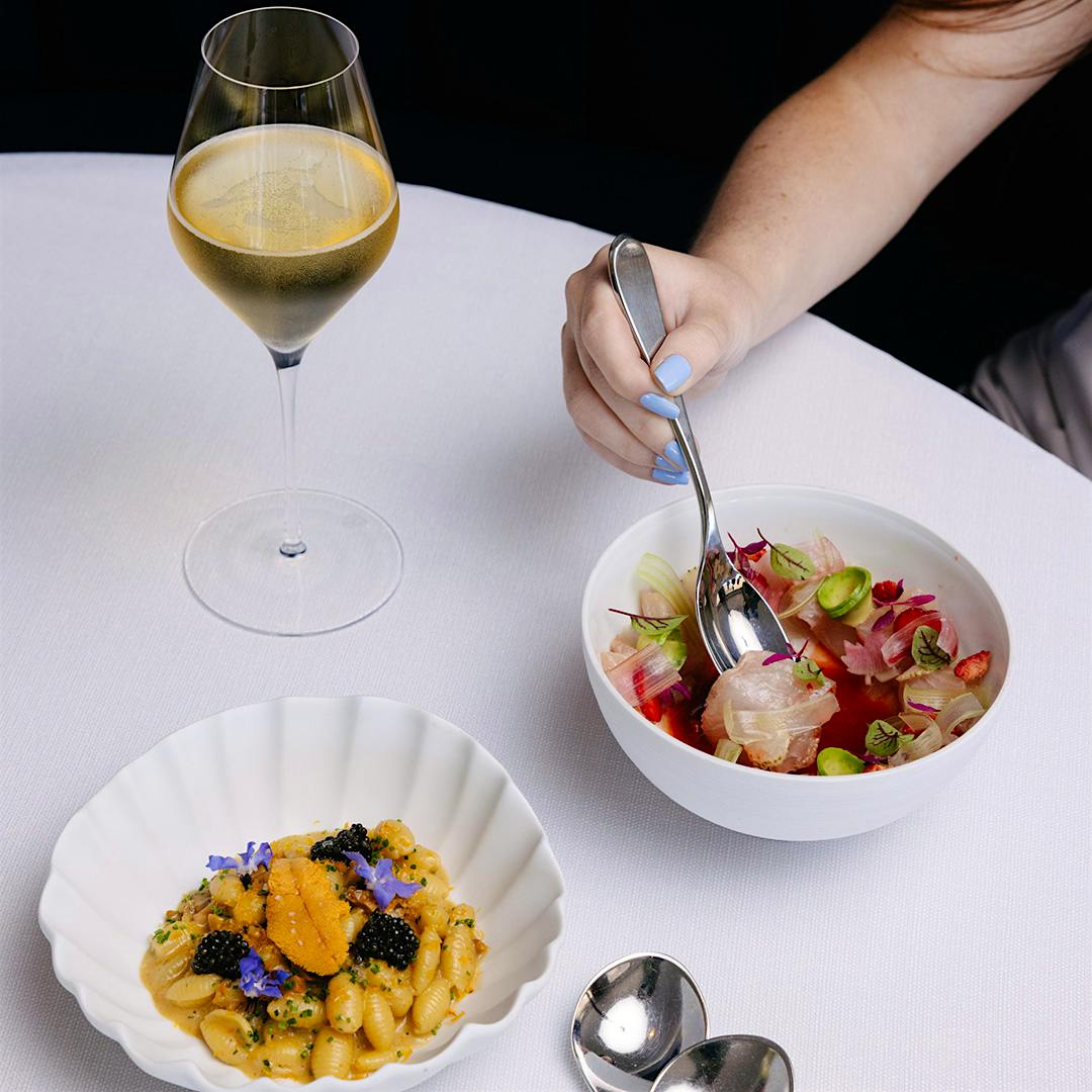  Gnocchetti sardi risottati (left) and Baja kanpachi from Caruso’s.
