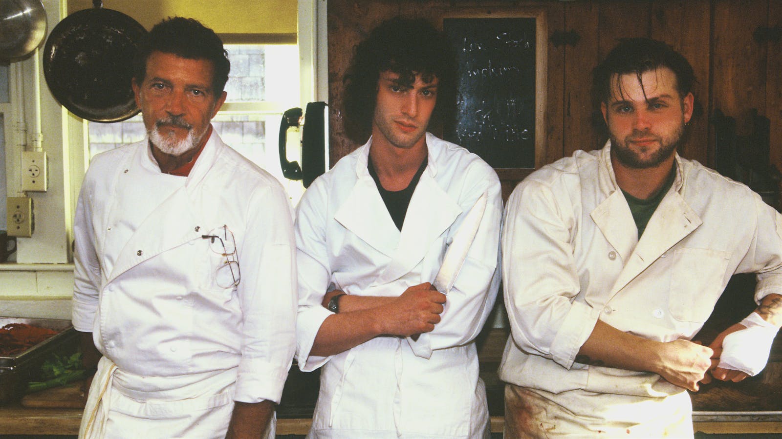 Dominic Sessa (center) stars as a young Anthony Bourdain in <i>Tony</i>; he’s joined by Antonio Banderas (left) and Leo Woodall.