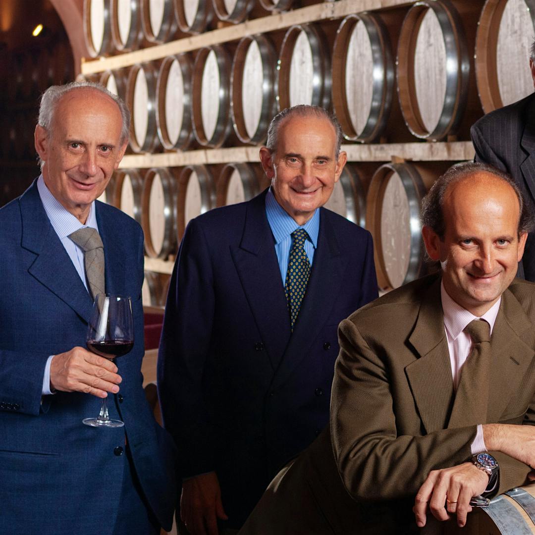Vittorio Frescobaldi, center, along with his brothers Leonardo, left, and Ferdinando, right, and son Lamberto, built their Tuscan winery into a global enterprise.