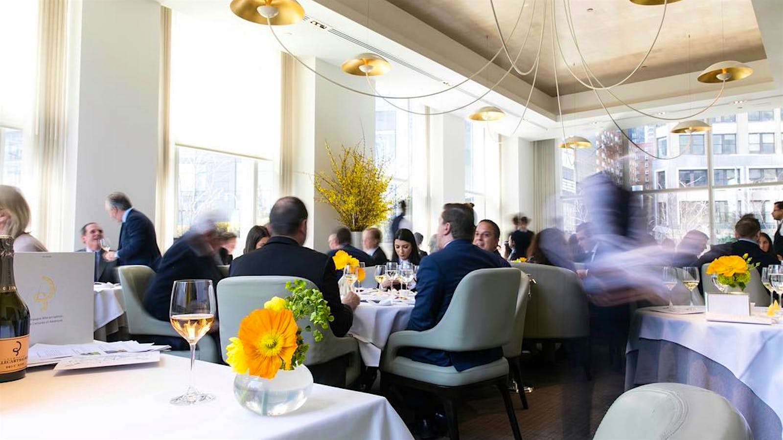 Guests dining inside Jean-Georges in New York.