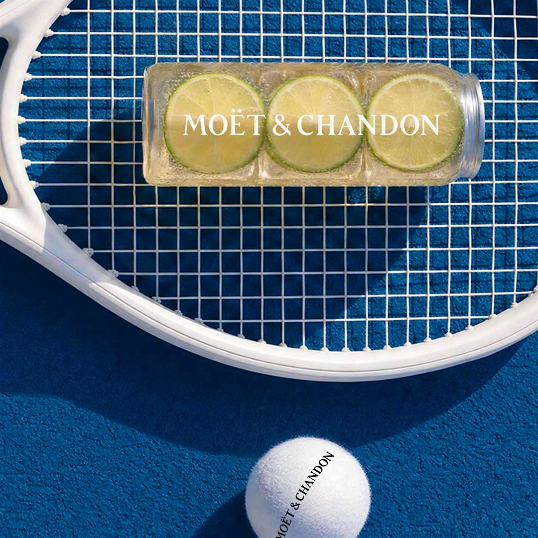 The official U.S. Open tennis balls will probably not be white, but the Champagne cocktail will be there.
